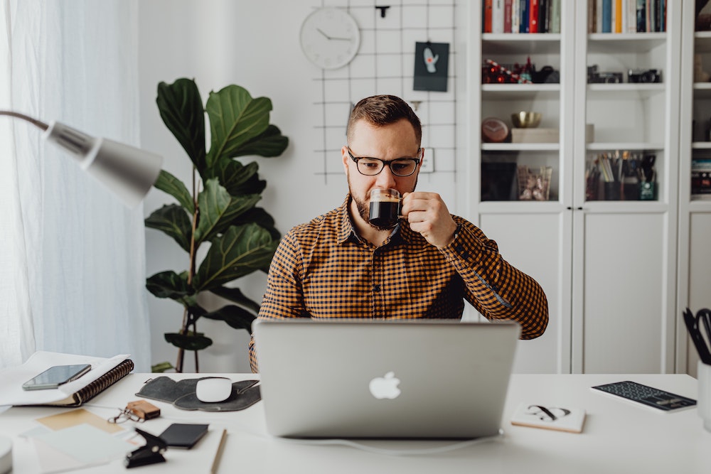 man working in his home office